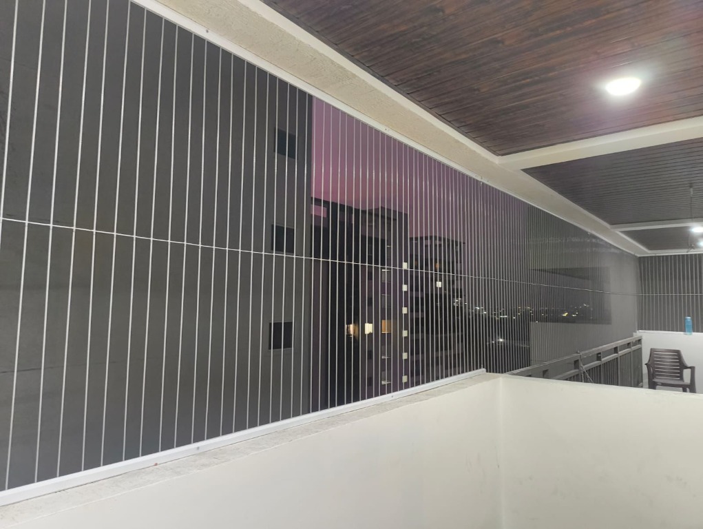Invisible grill system with slim protective cables and open balcony